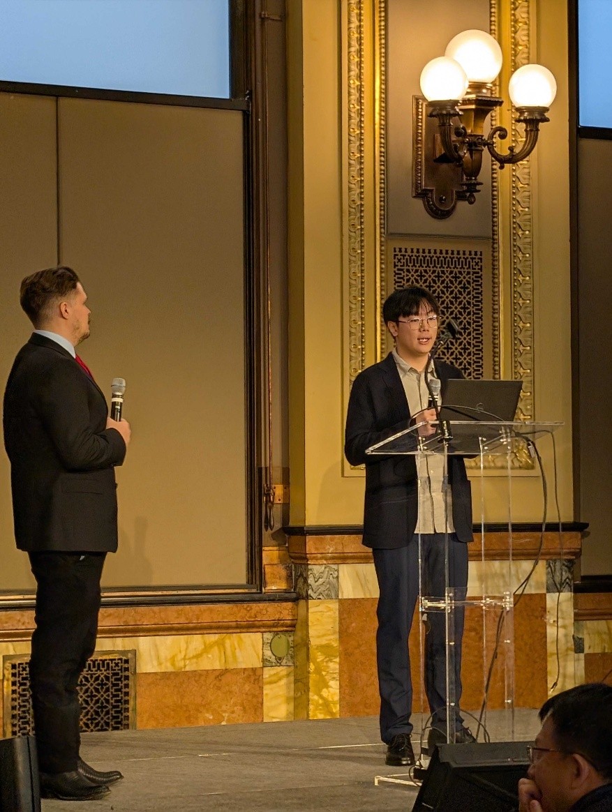 Peter Girnus and Demeng Chen explaining the FENRIR system