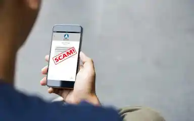 A man holding his phone