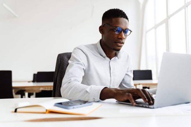 man working on laptop